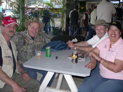 International competitors enjoying refreshments after a day's shooting